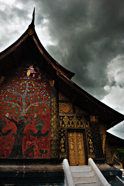 Luang Prabang temple in a storm. Copyright Aloha Lavina.