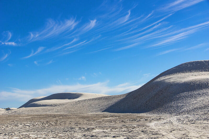 sandy dunes and blue skies