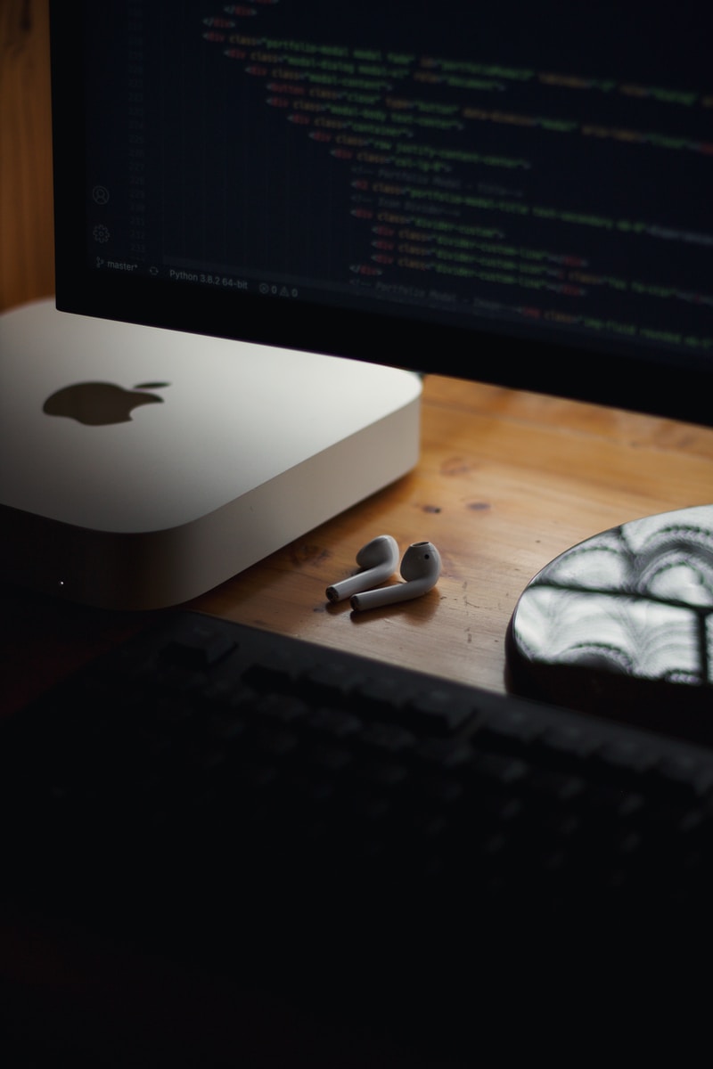 mac mini beside black computer keyboard