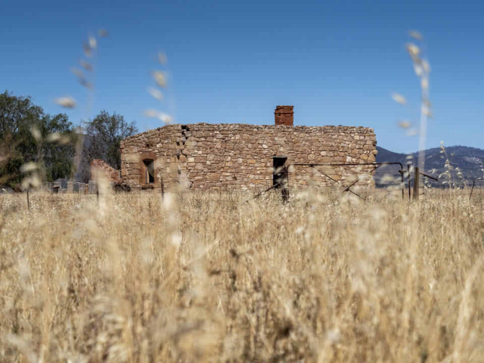 minimal composition field stone building