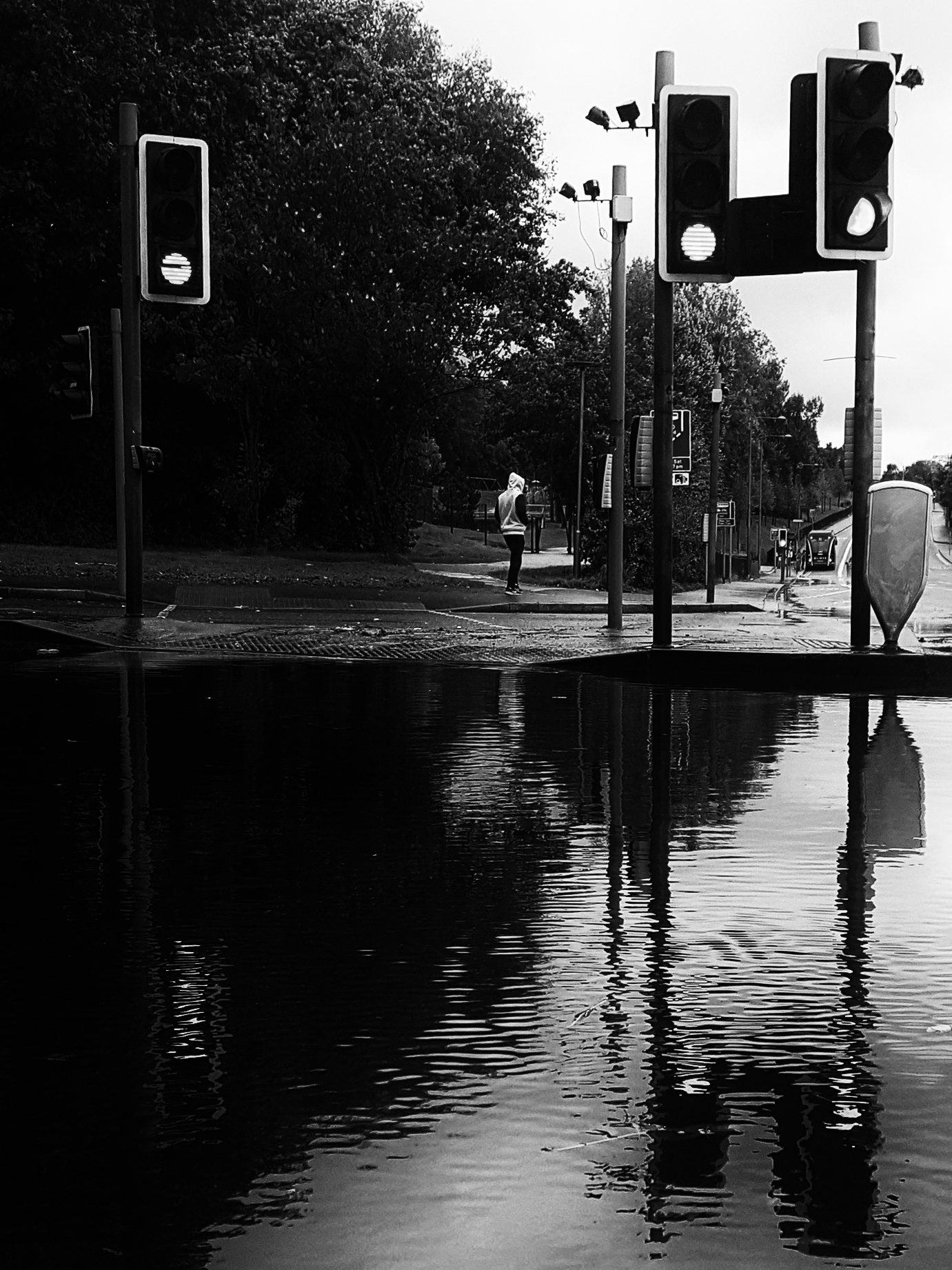 black and white puddle street photography
