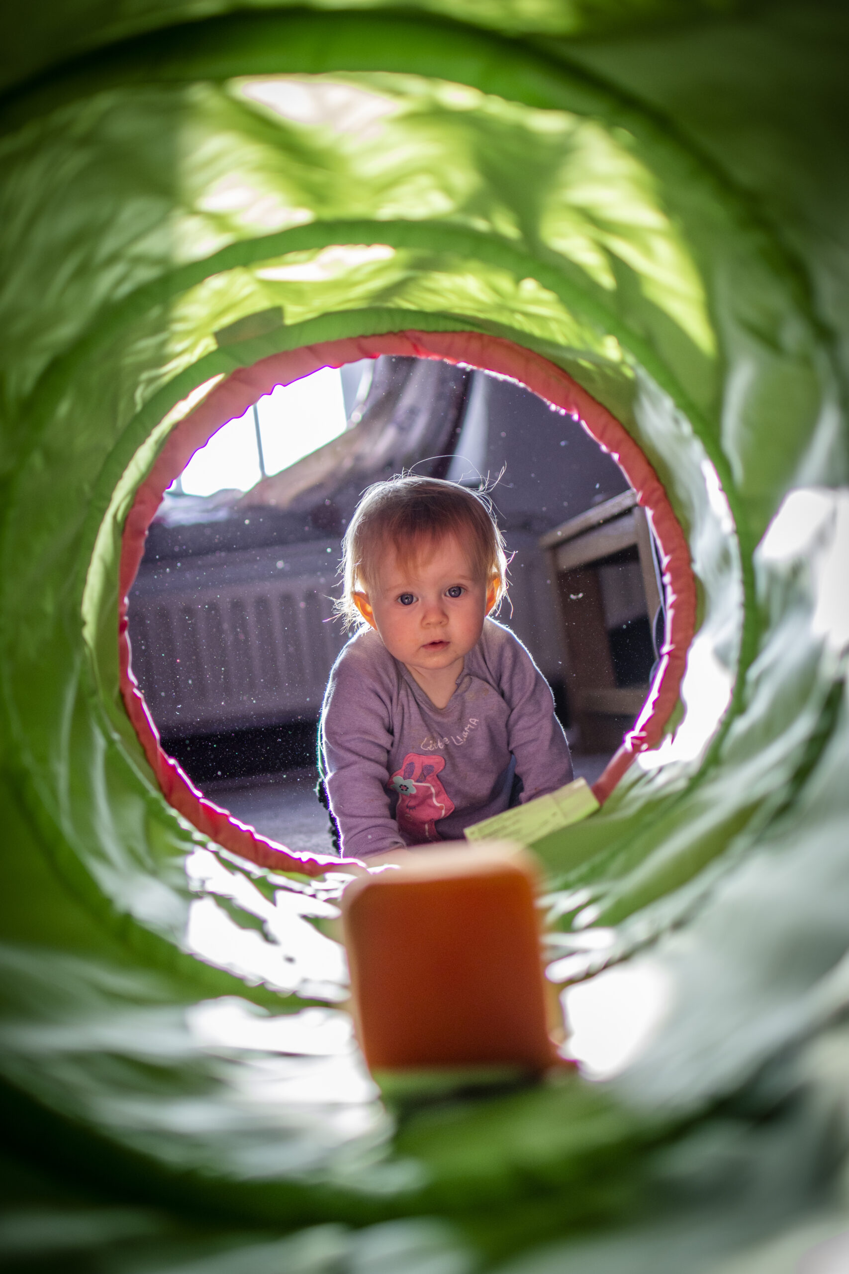 child entering a tunnel