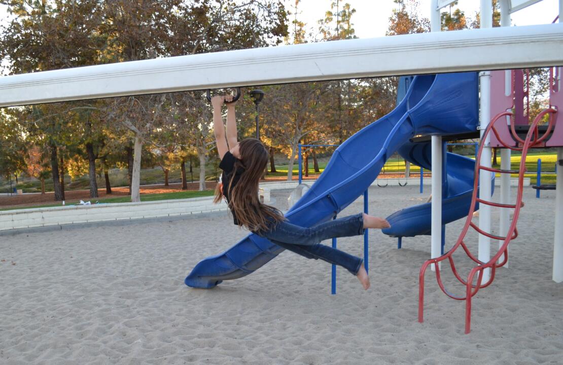 child at a playground high speed