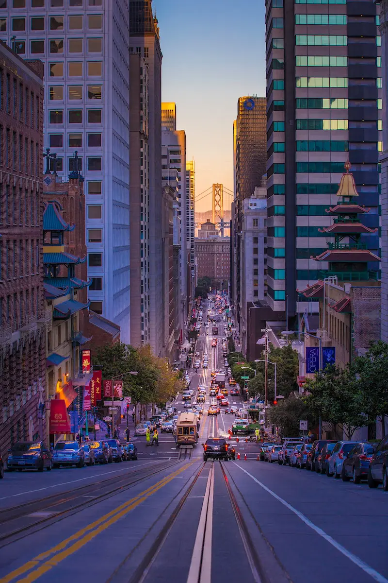 Road surrounded by high rise buildings in San Francisco.