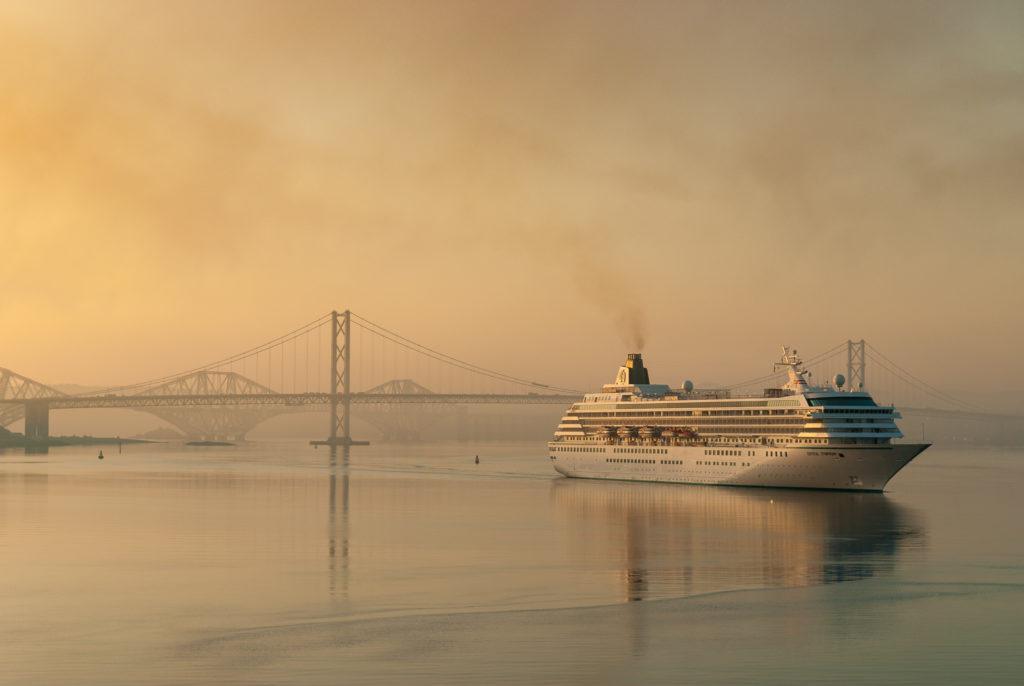 Cruise ship at dawn with Forth Bridges
