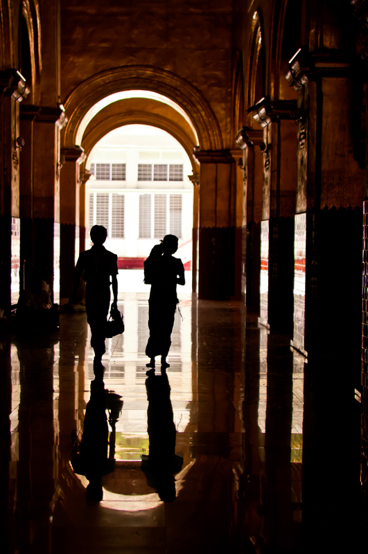 silhouettes in a temple in Burma copyright Aloha Lavina