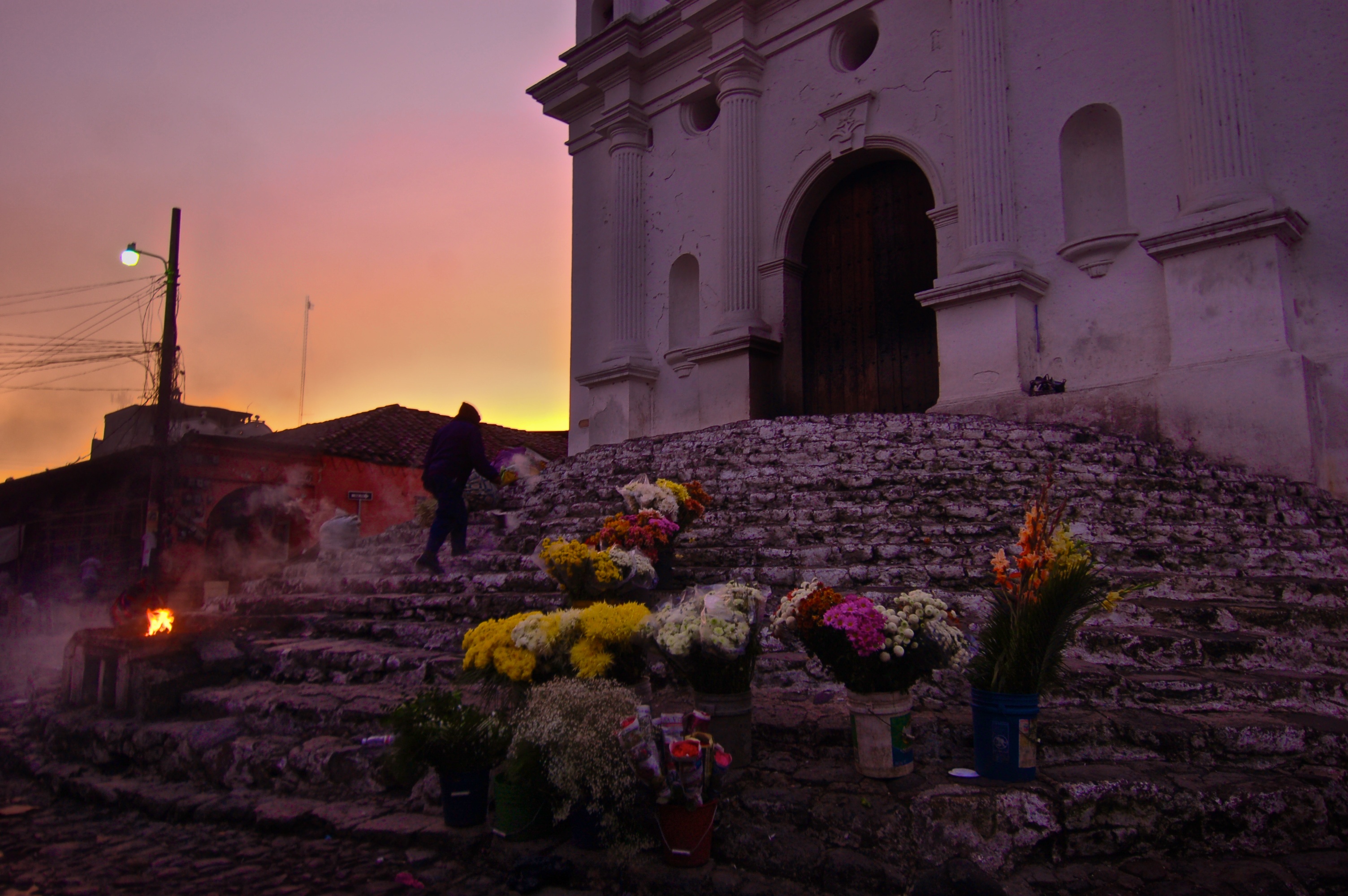 Dawn comes upon the Santo Thomas Church on market day in Chichicastenango. 