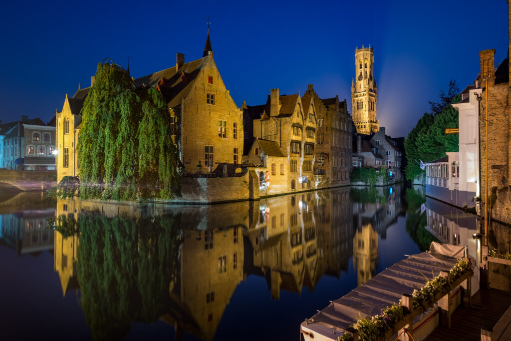 Bruges Belfry in the Evening as seen from the Dijver Canal