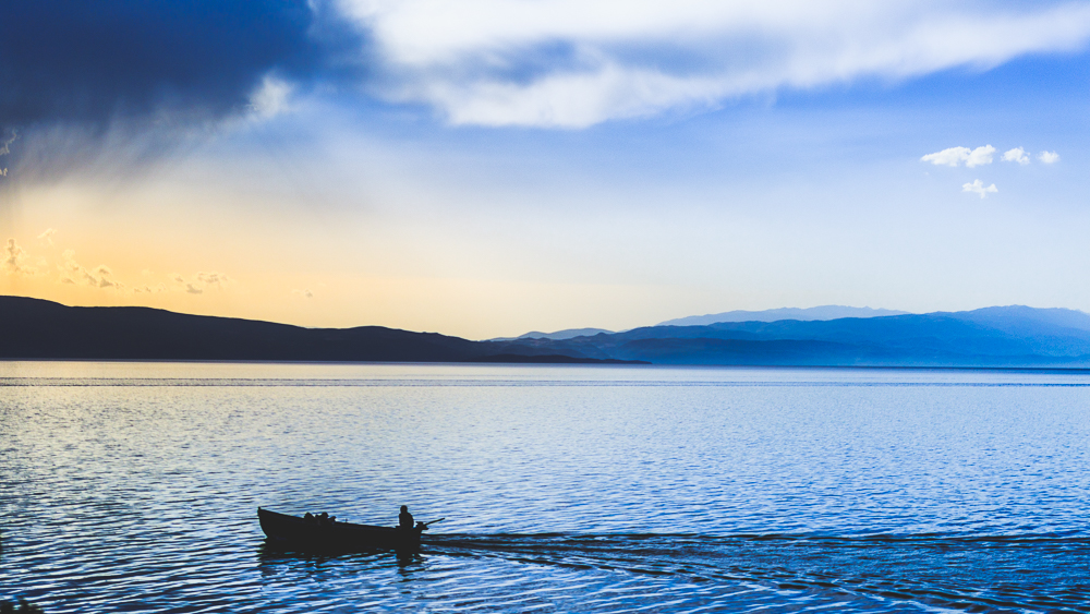 Lake scene during blue hour. Shot in Ohrid, Macedonia. Photo by Dzvonko Petrovski. All rights reserved.