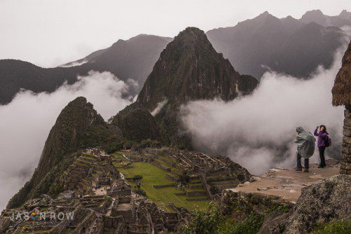 The tourists here show the immense size of Maccu Picchu