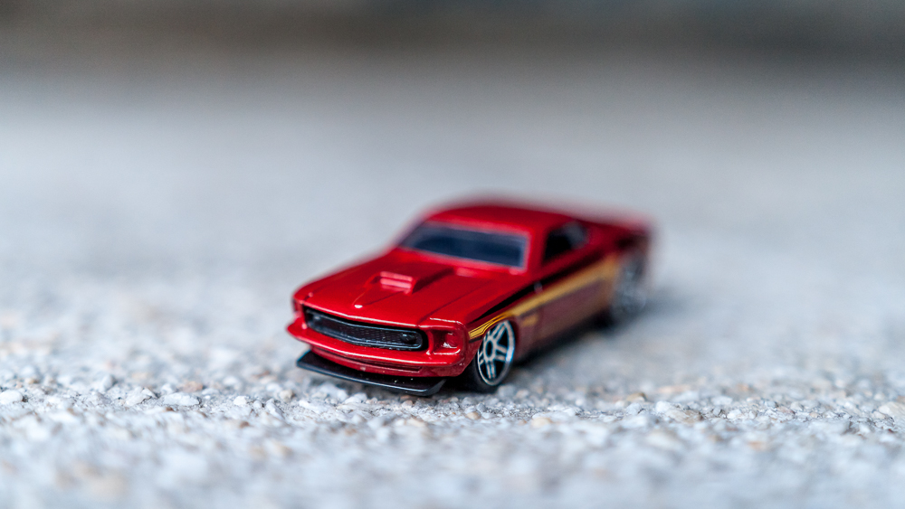 1:64 scale Hot Wheels model car shot at f/1.8 on 35mm on a crop sensor. Using the Sigma 18-35mm at its minimum focusing distance. No extension tubes. As you can see it can barely cover 1/10th of the model car.