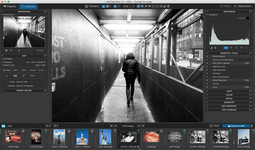 a person walking down a tunnel