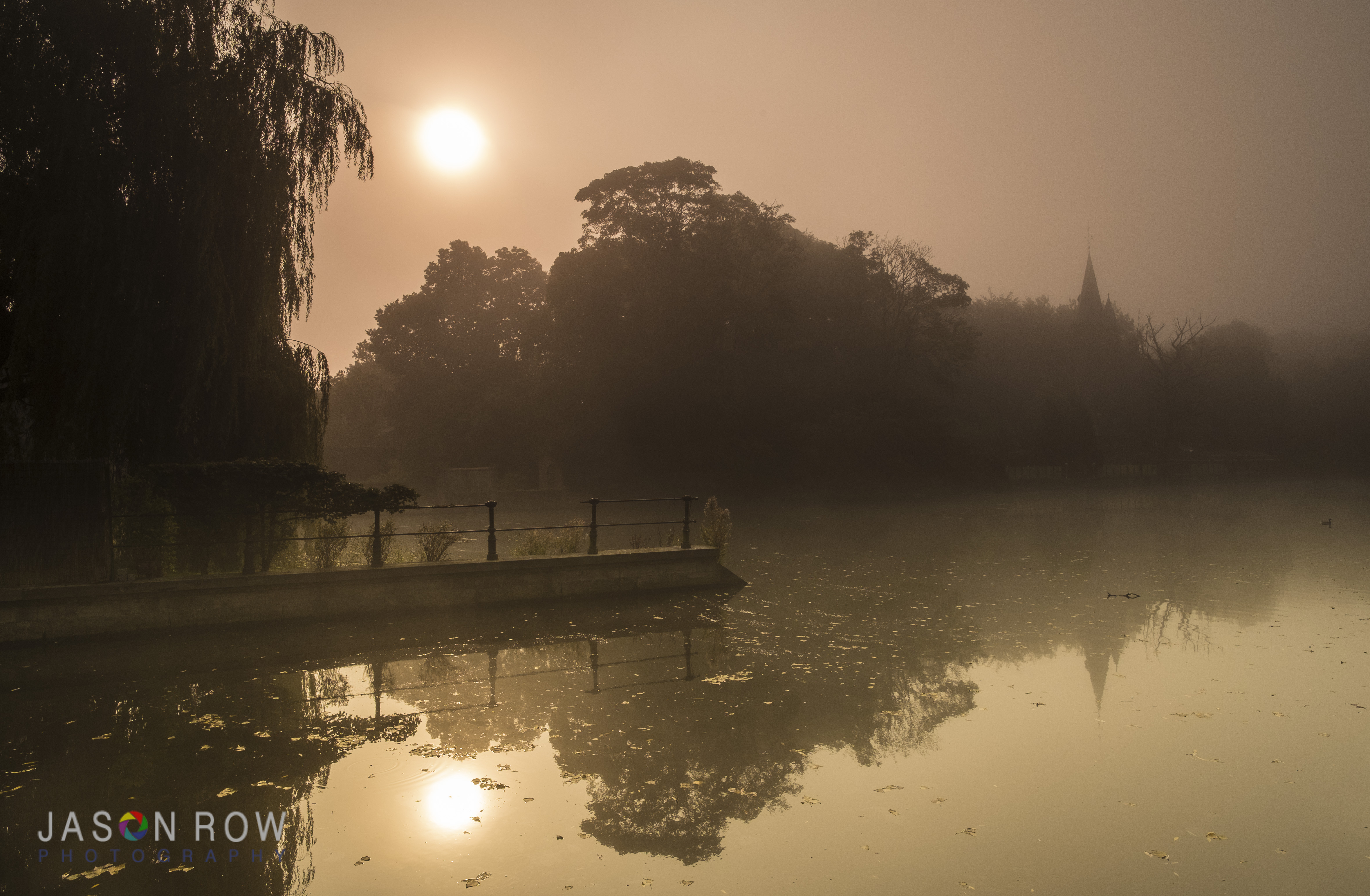 A golden dawn on Minnewater in Bruges. By Jason Row Photography