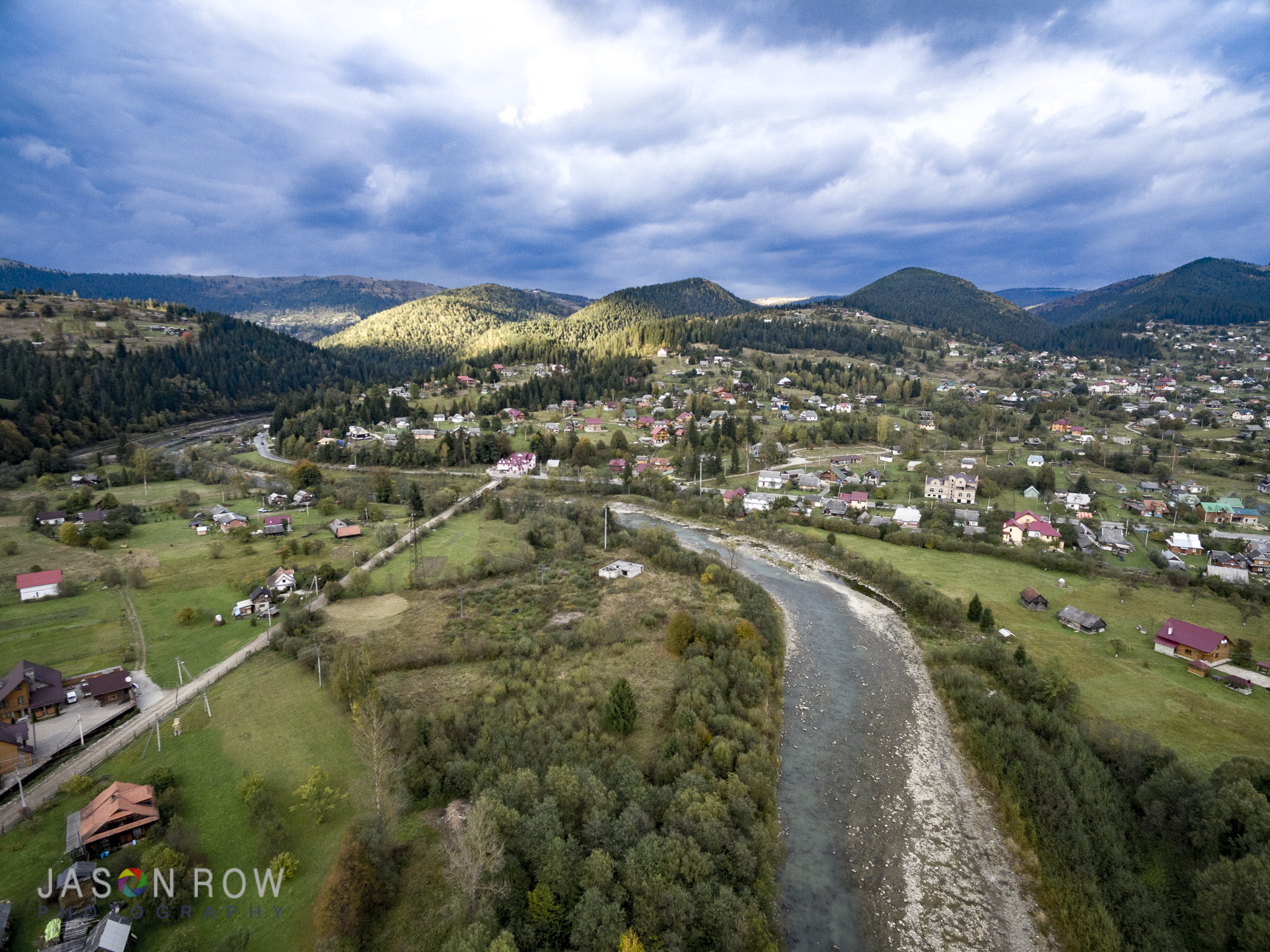 The mountains take on a different perspective from the air. By Jason Row Photography