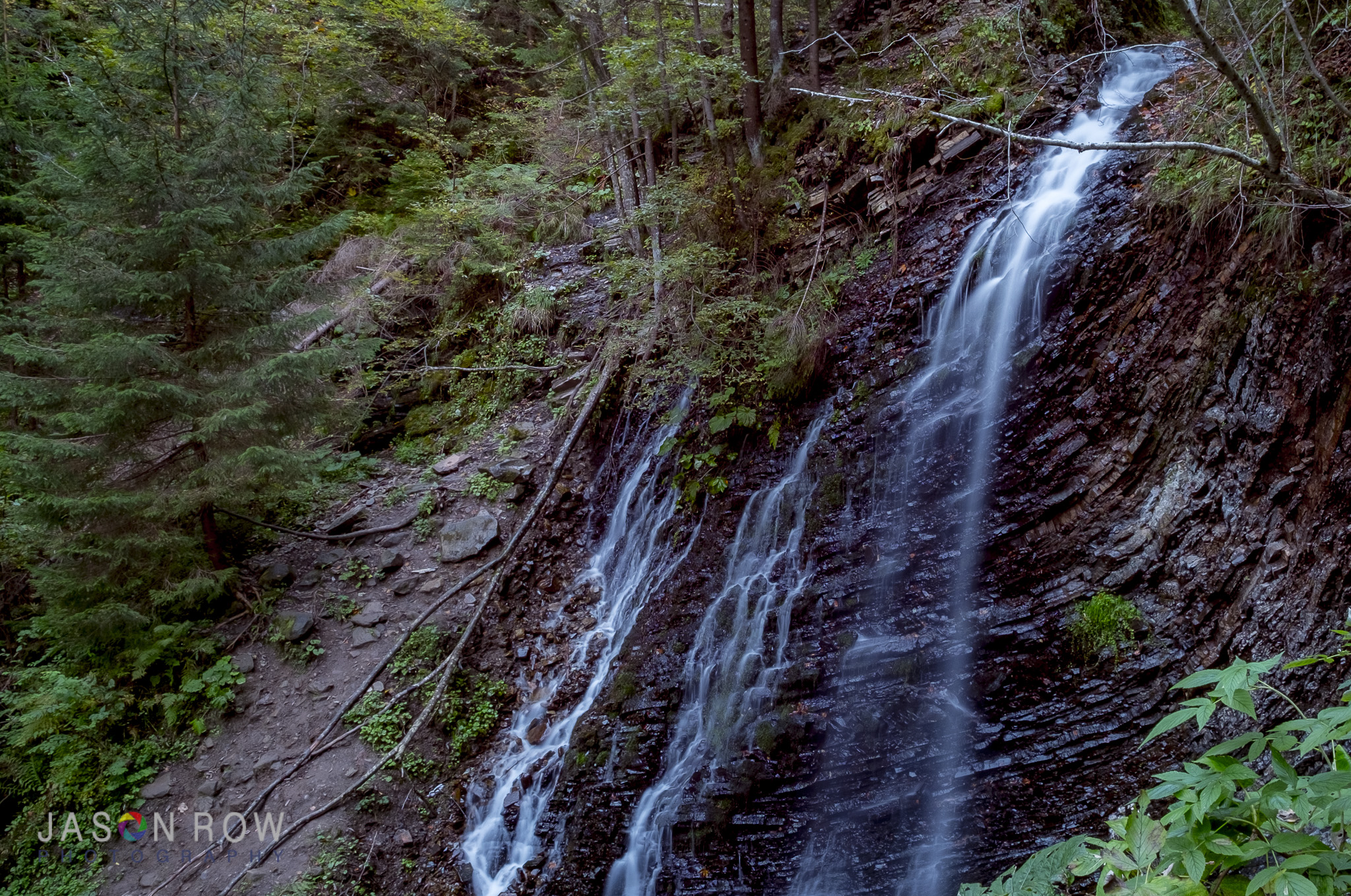 A small but pretty waterfall. By Jason Row Photography