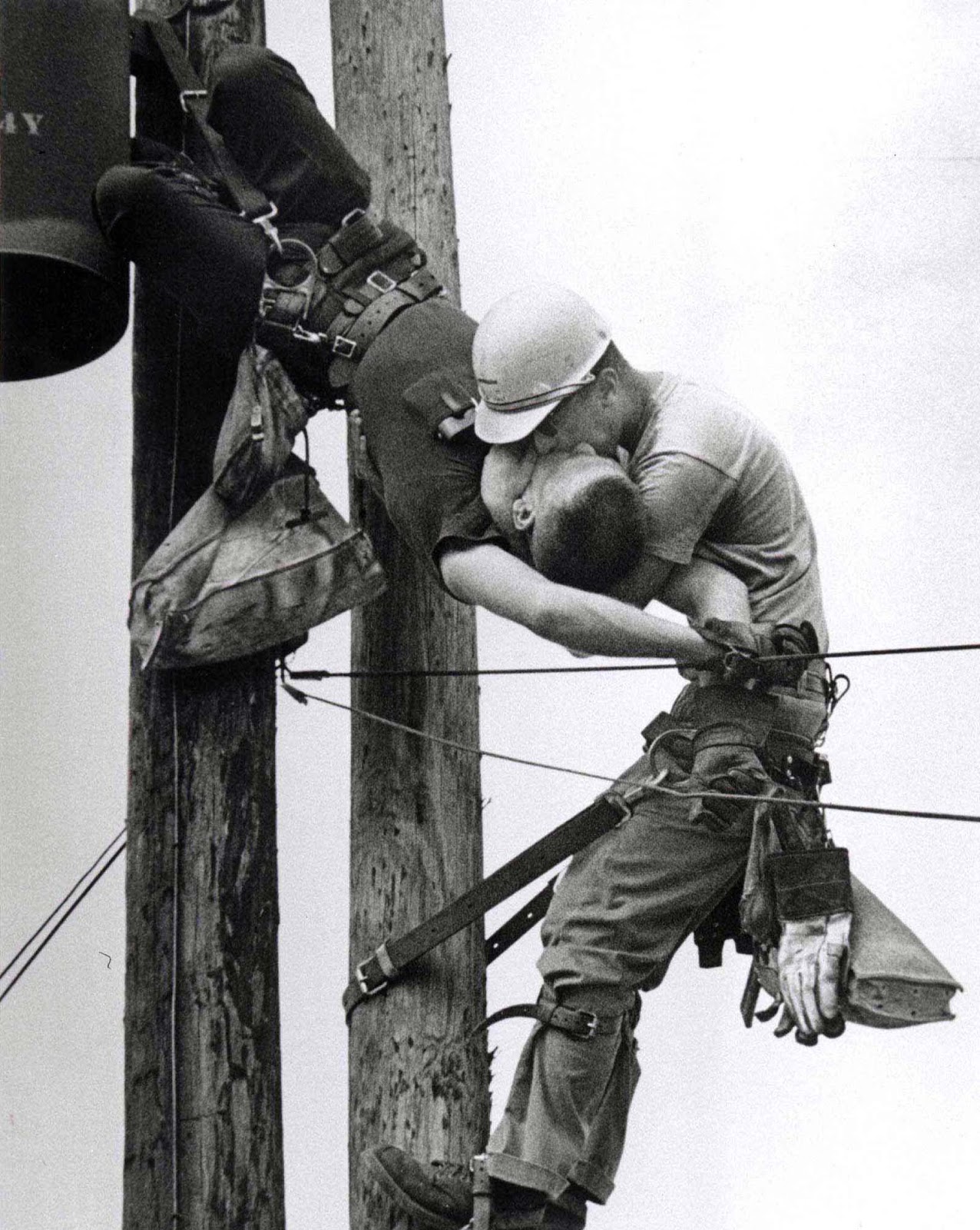 the-kiss-of-life-a-utility-worker-giving-mouth-to-mouth-to-co-worker-after-he-contacted-a-high-voltage-wire-1967