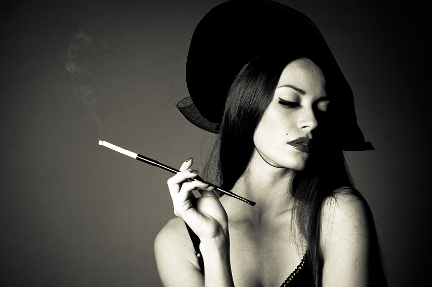 woman in hat with cigarette