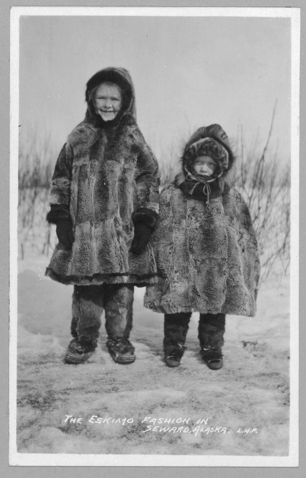 Children in Eskimo fur clothing