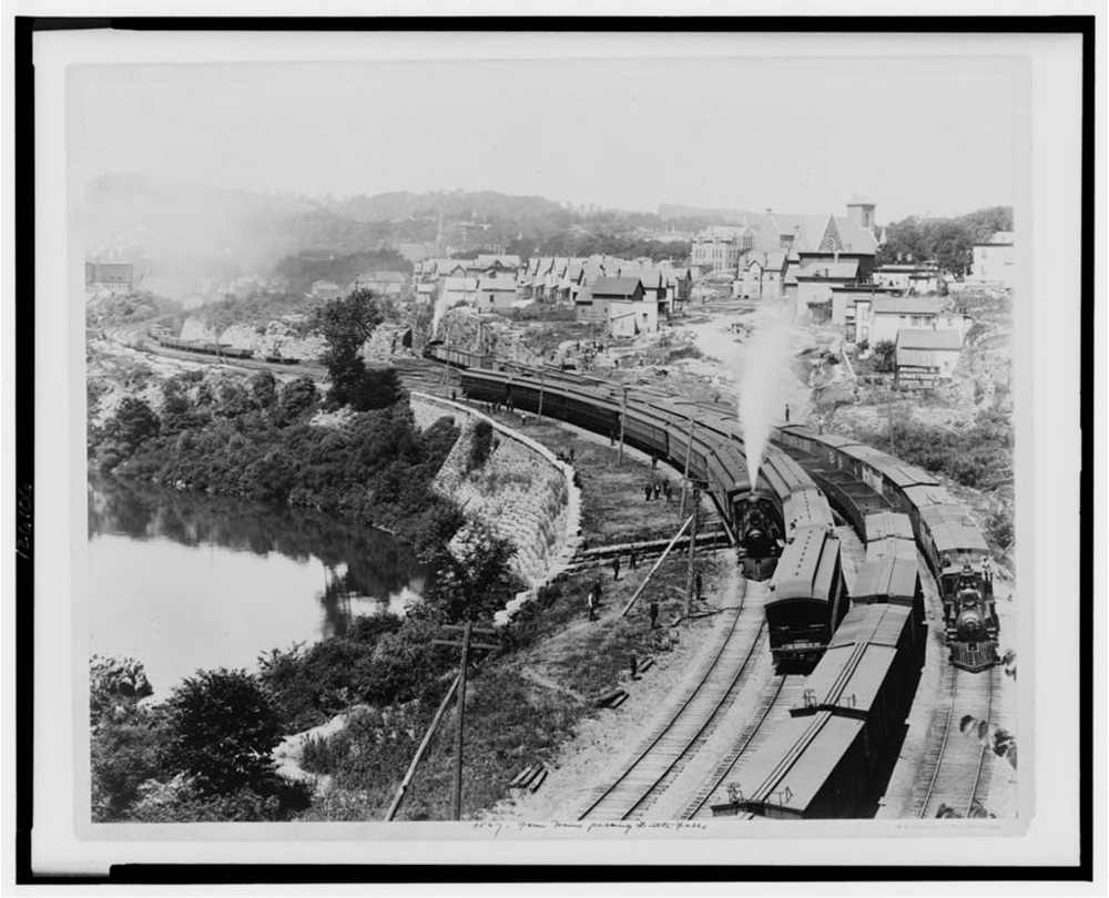 Four trains passing Little Falls