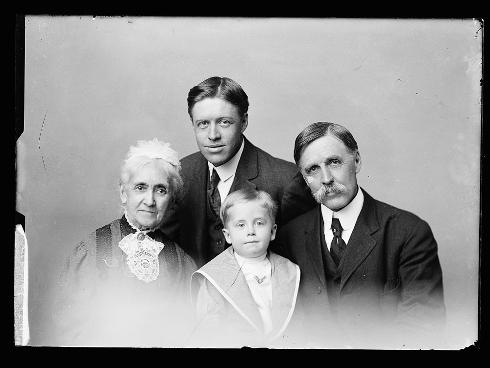 [William Henry Jackson (right) with his mother, Harriet Jackson (left), his son Clarence S. Jackson and young son Billy (center) in a family portrait]