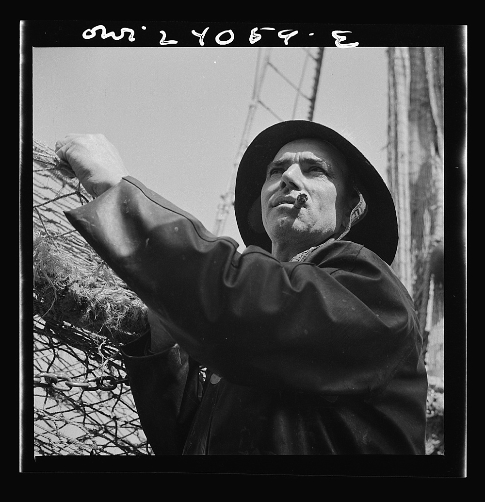 New York, New York. A New England fisherman preparing his boat to leave the New York docks