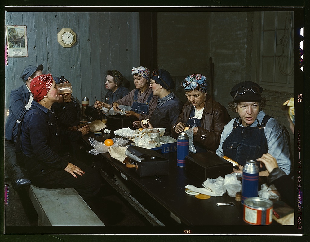 Women workers employed as wipers in the roundhouse having lunch in their rest room