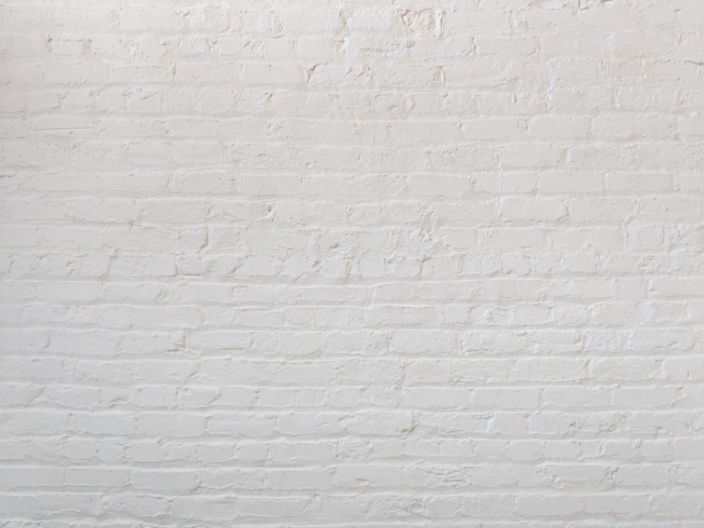 white brick wall simple photography tips