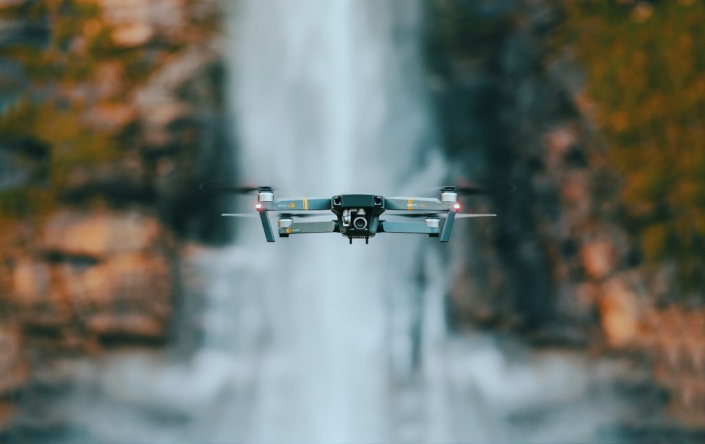 selective focus photography of quadcopter drone