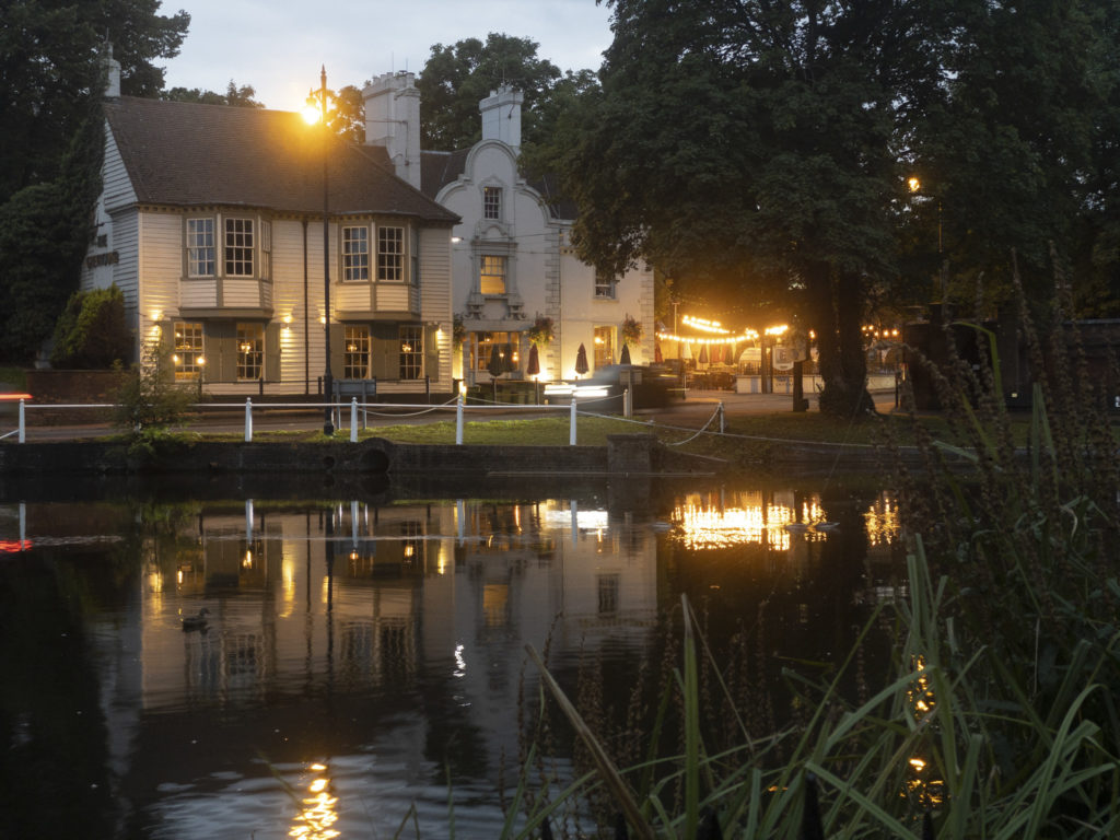 Pretty pond and pub at blue hour