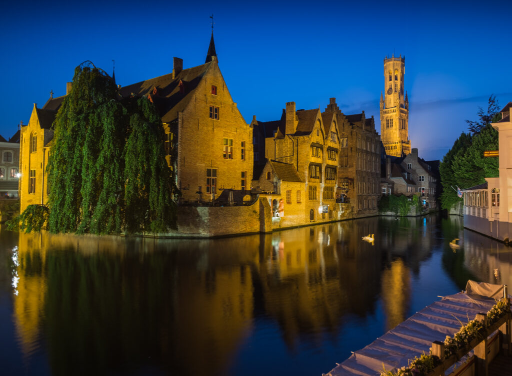 Bruges Belfry in the Evening as seen from the Dijver Canal