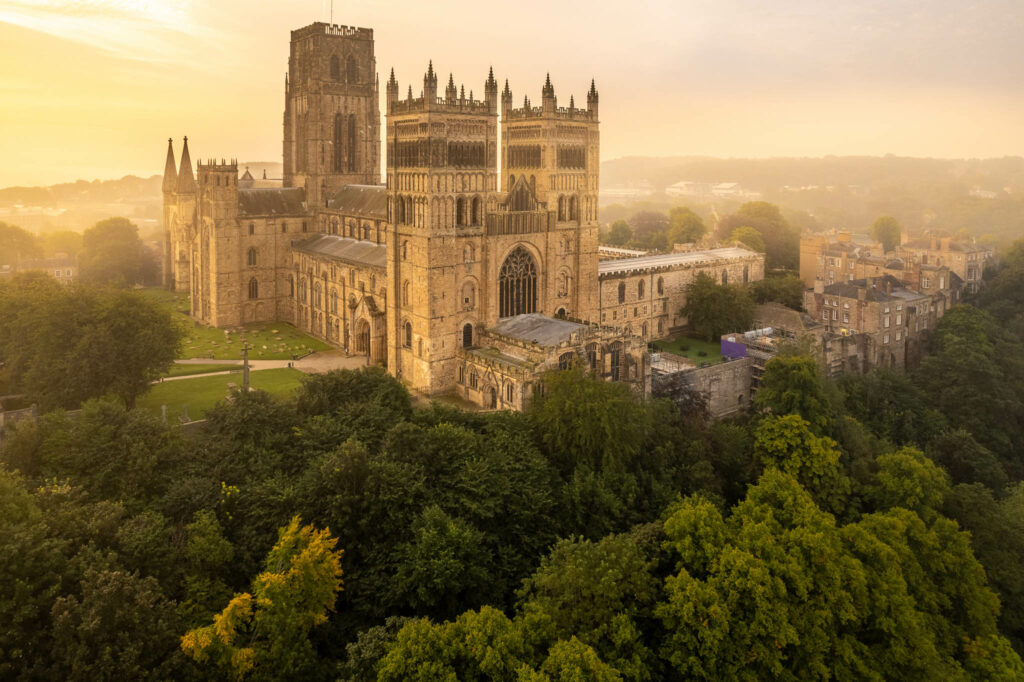 Stunning dron eimage of Durham Cathedral on a misty autumn morning 