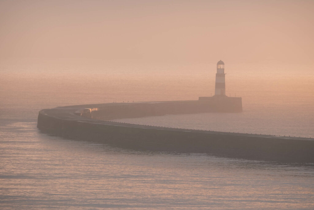 Seaham lighthouse on a mist winter dawn