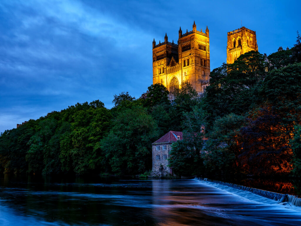 Blue hour shot of Durham Cathedral and River Wear in NE England 