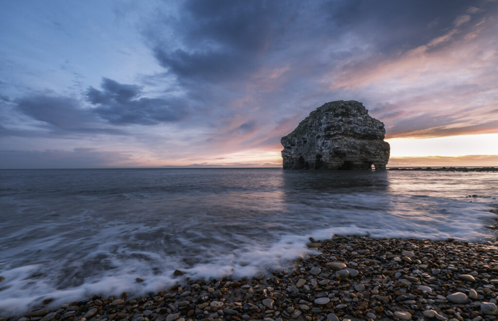 Long exposure shot of Marsden beach and rock at sunrise