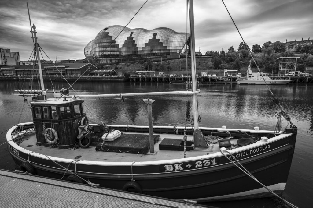 Trawler on Tyne in Newcastle with Sage Centre Behind