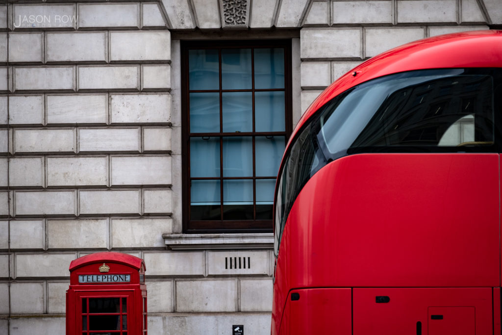 Red London bus with red telephone box