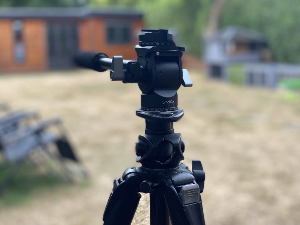 compact video tripod head on tripod