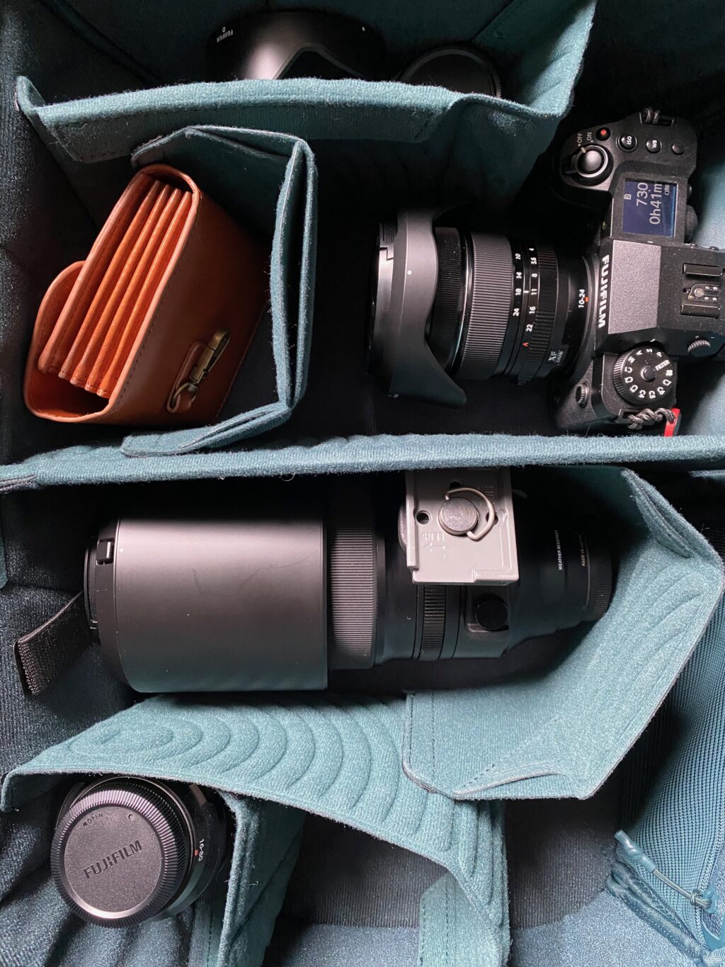 A PGYTech backpack with Fujifilm camera sytem inside. 