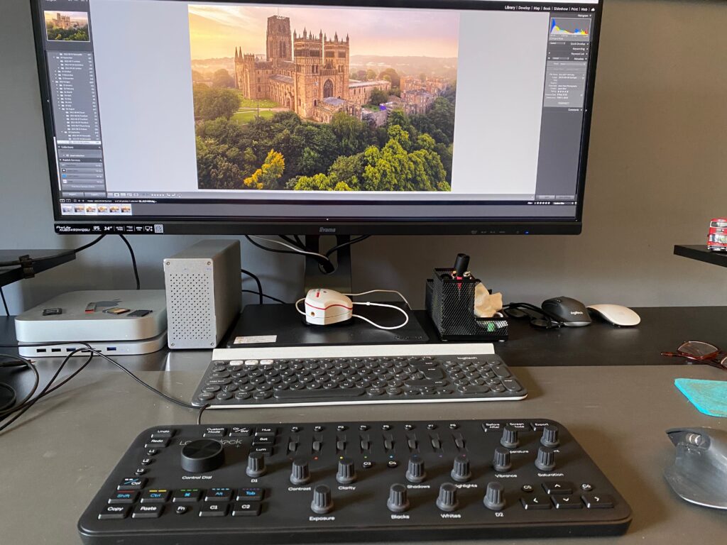 A photographers desk featuring a loupedeck 