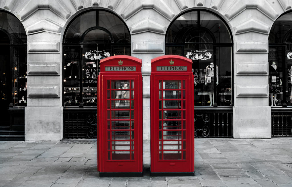 Two British red telephone boxes back to back