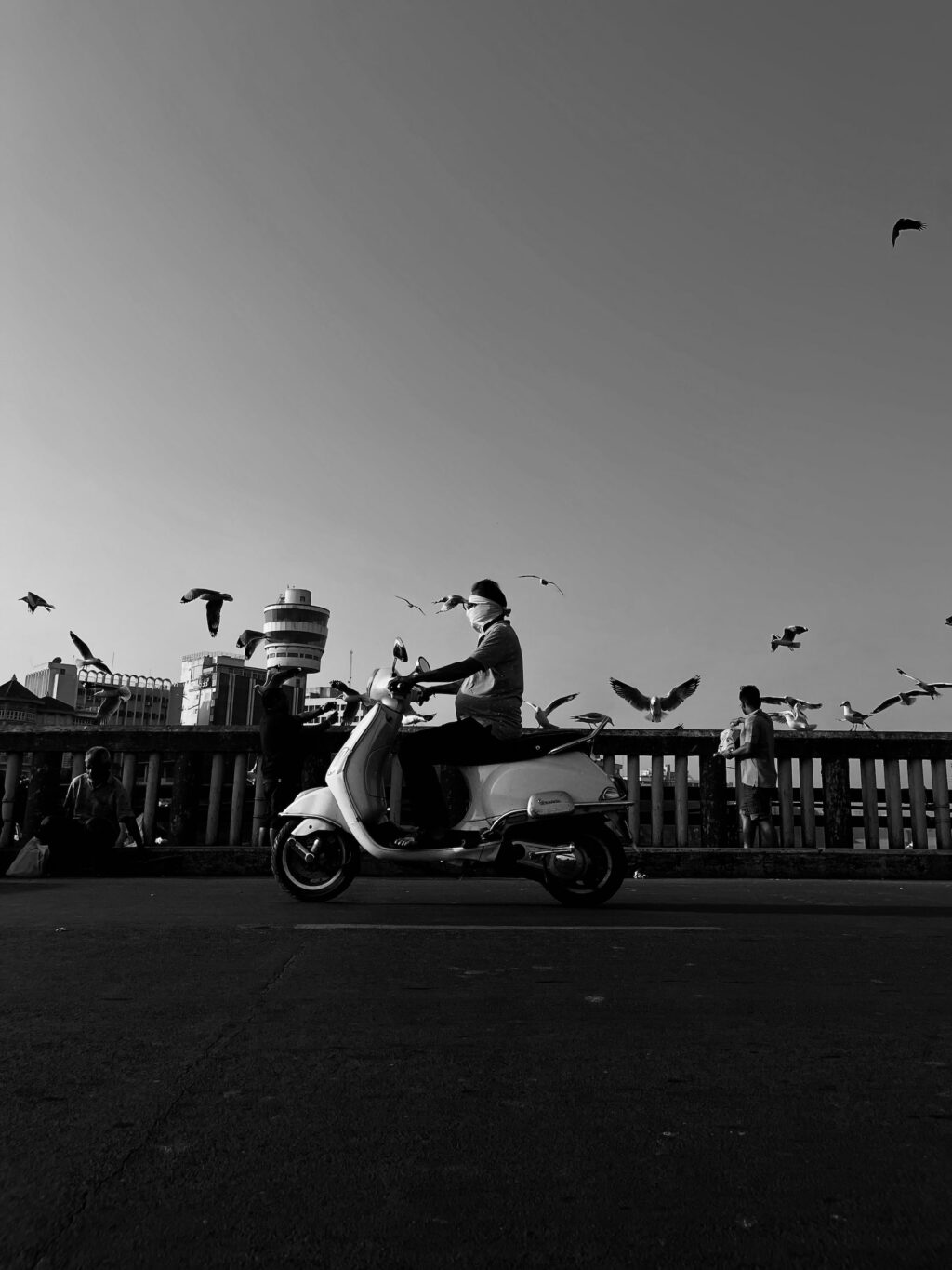 black and white street shot motorbike