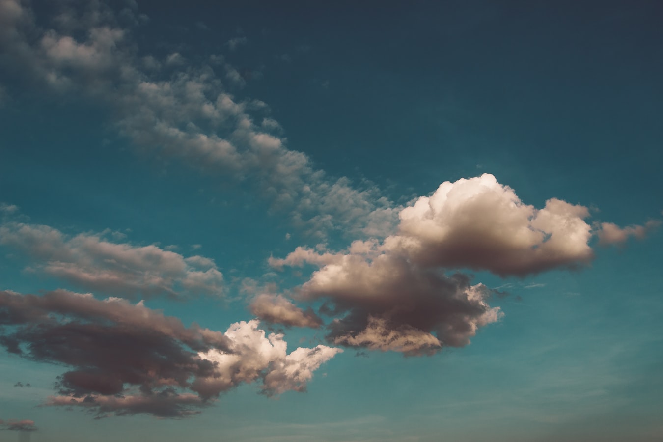 blue skies with gray clouds