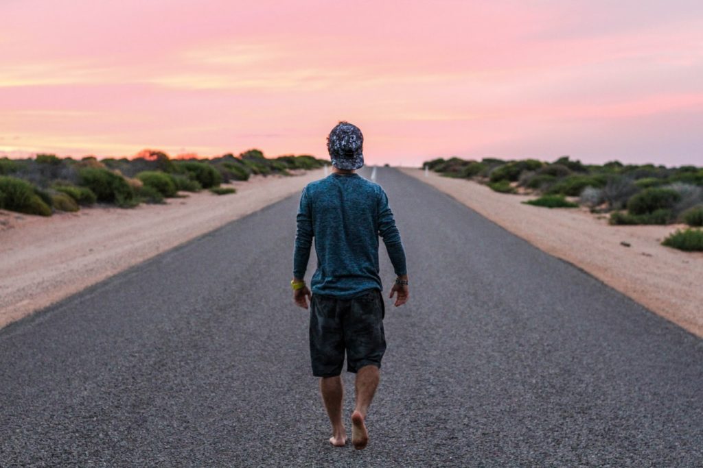 man on road