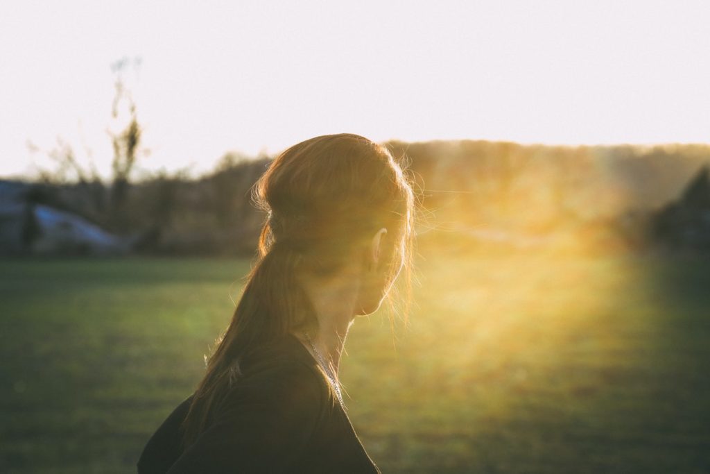 portrait with golden light flare lens flare photography