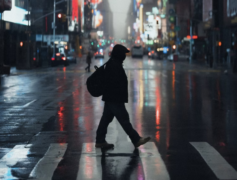 man crossing the street