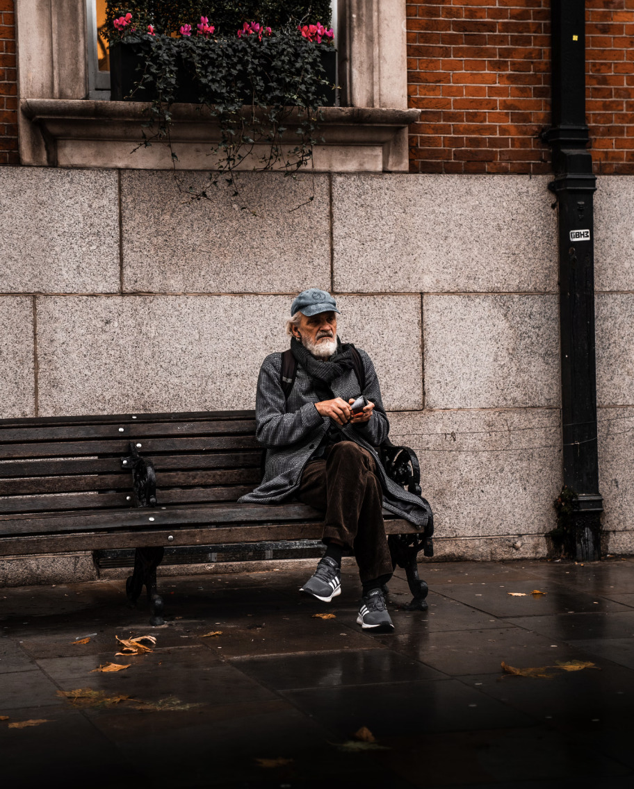 old man sitting on a bench