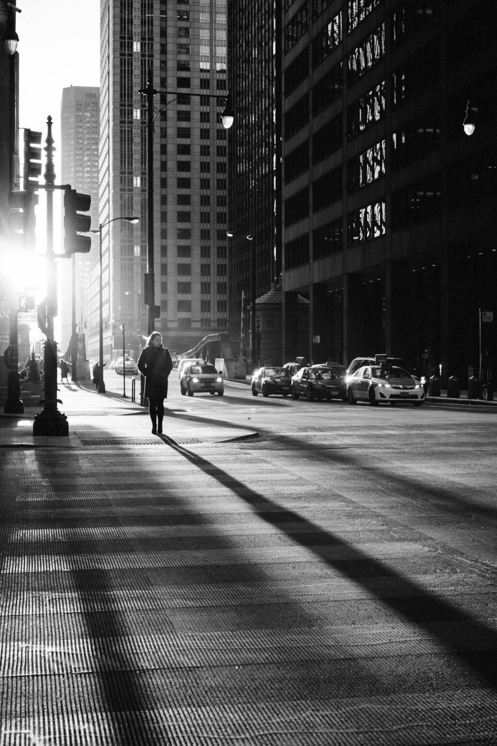 black and white street shot long shadows