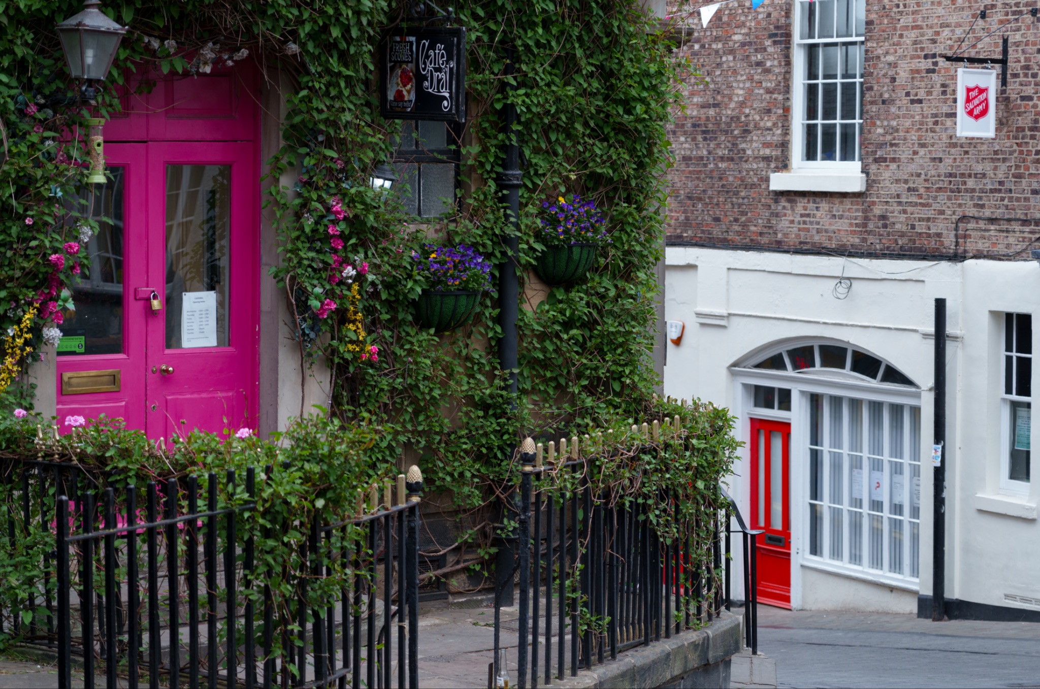 A pretty, pink doored cafe in the heart of Durham, UK