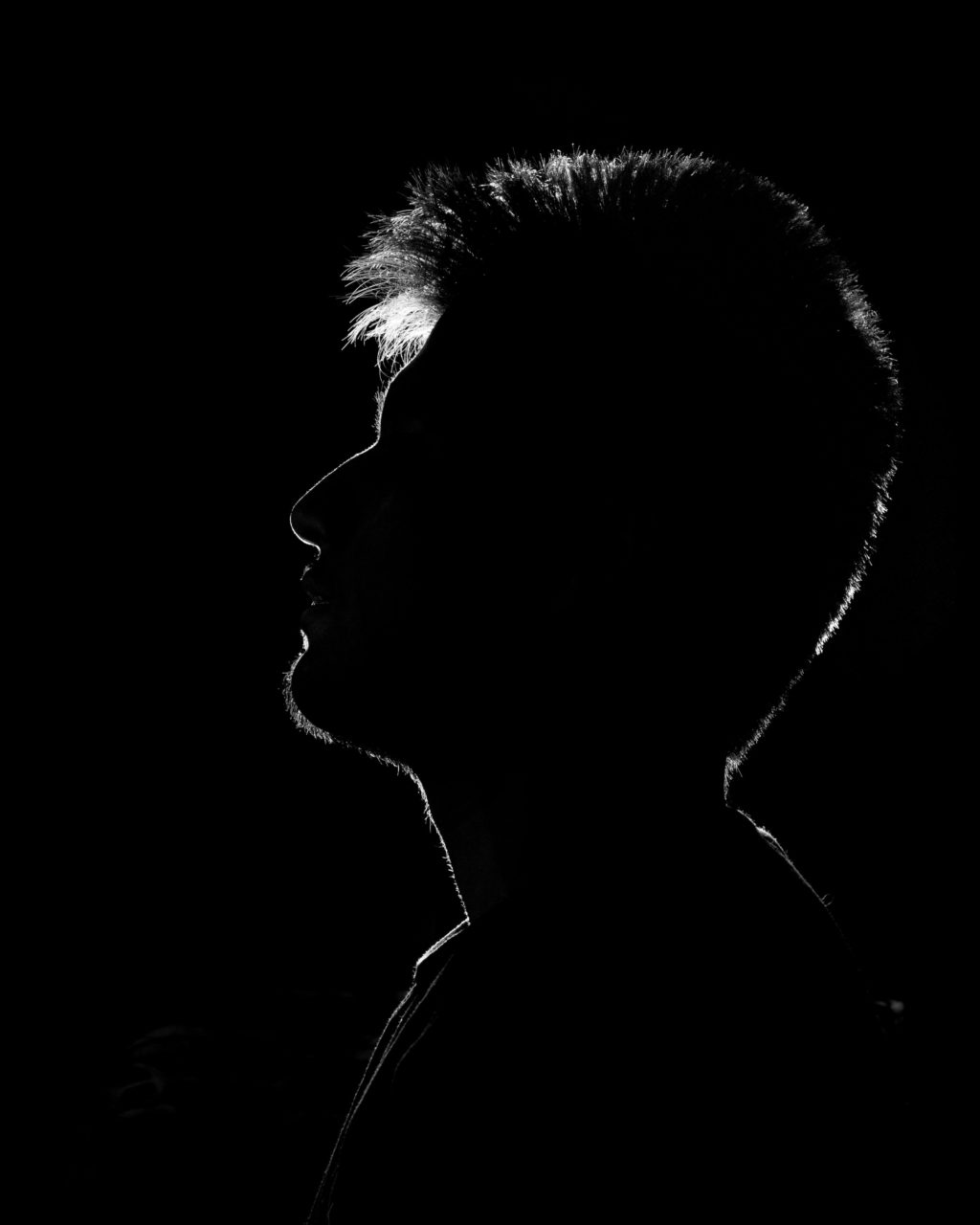 rim light portrait in black and white