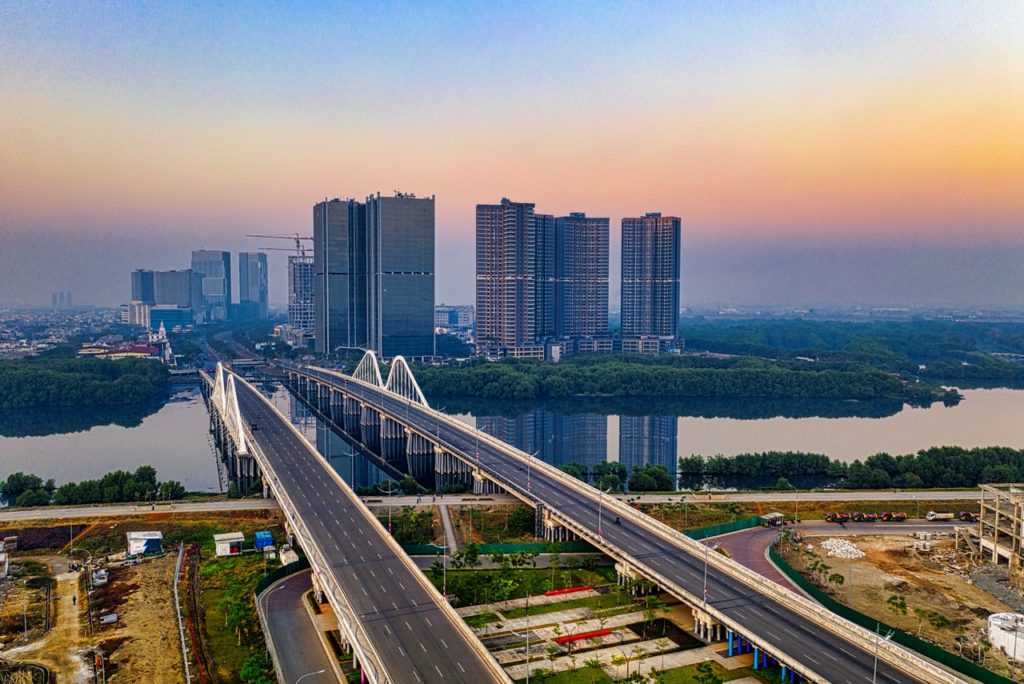 aerial view of city buildings and bridges